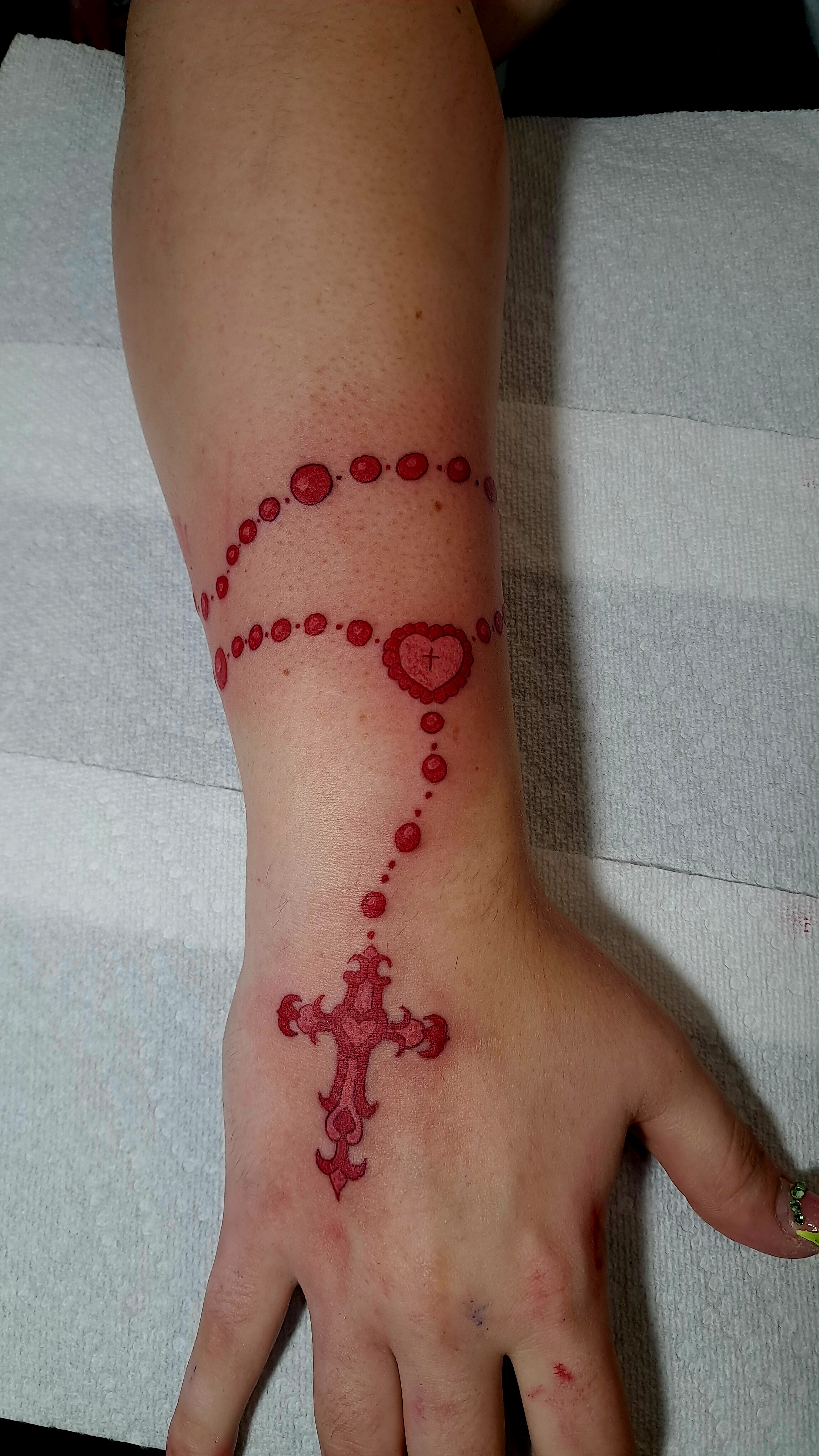 Rosary tattoo