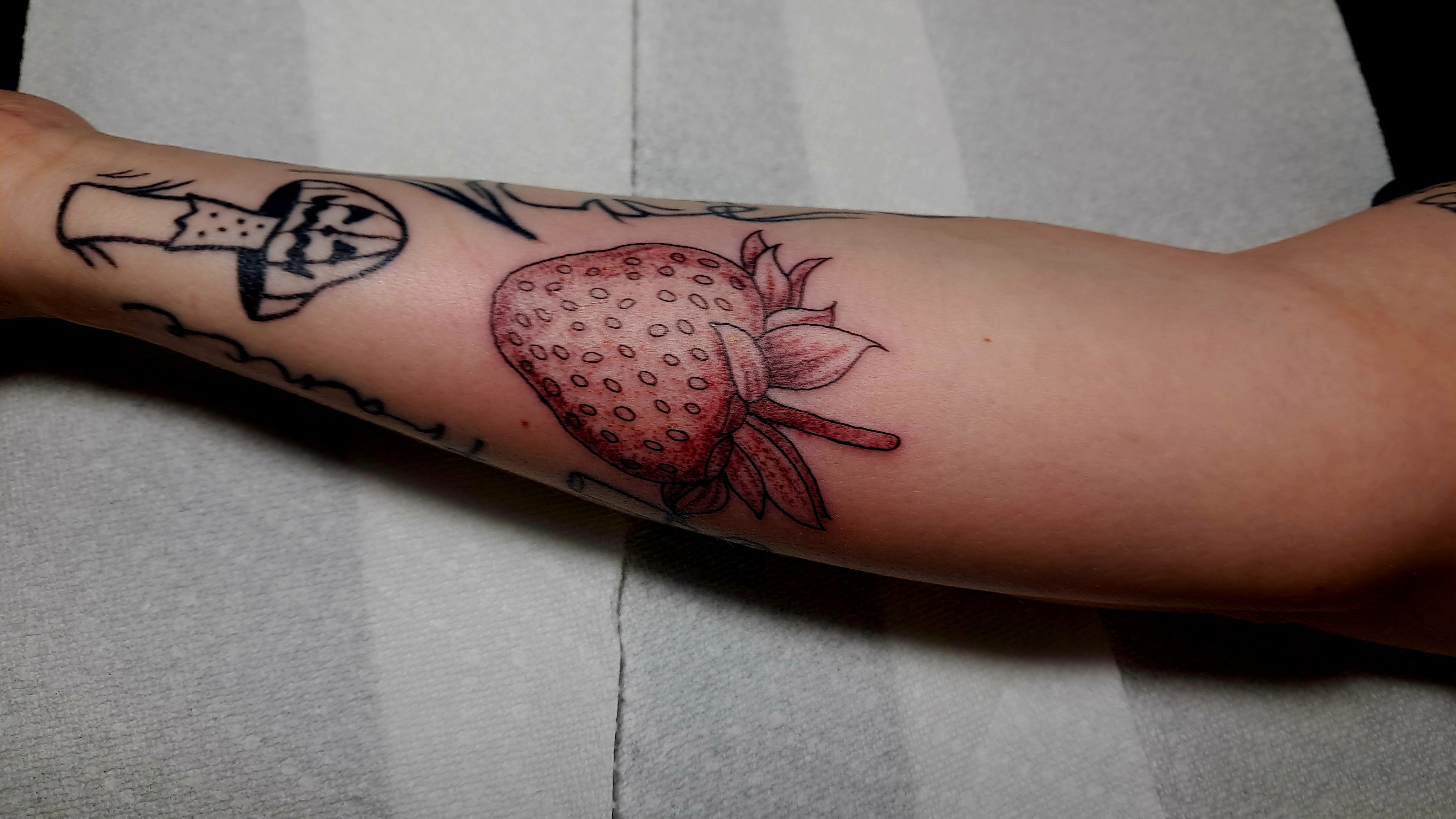 Strawberry tattoo